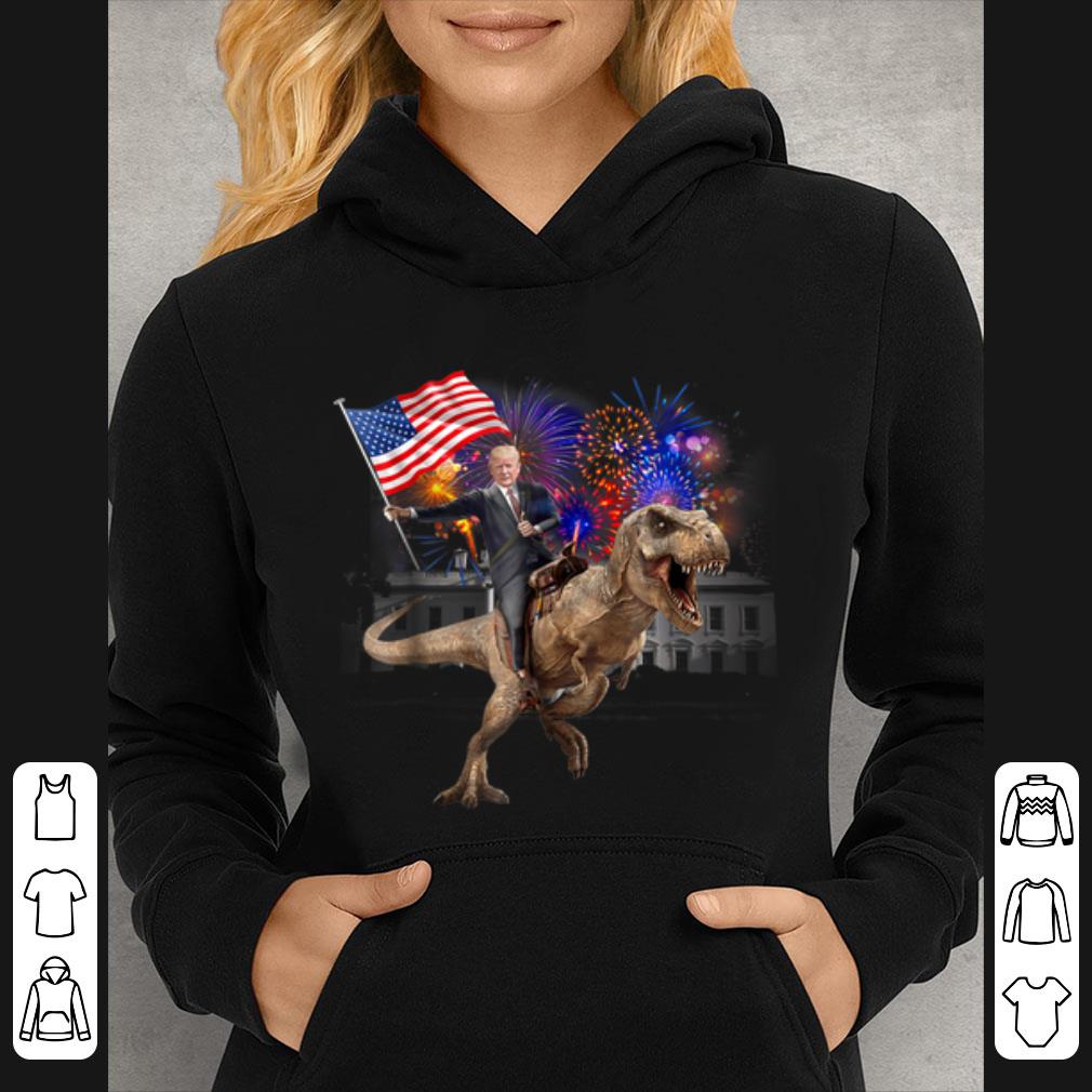 Official Trump Riding a Dinosaur T-rex Fireworks American Flag shirt 1 Official Trump Riding a Dinosaur T-rex Fireworks American Flag shirt