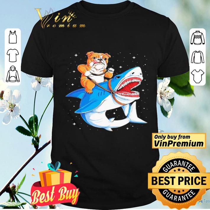 Pug dog riding a shark shirt