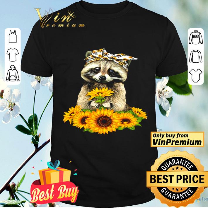 Raccoon holding sunflower shirt