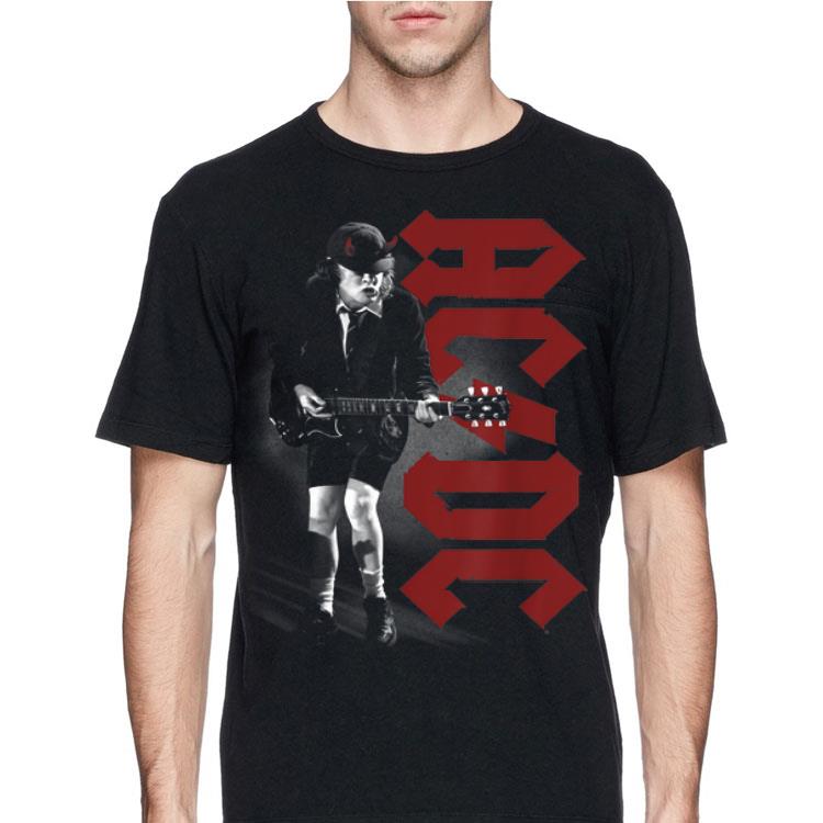 Angus Young Biography ACDC shirt