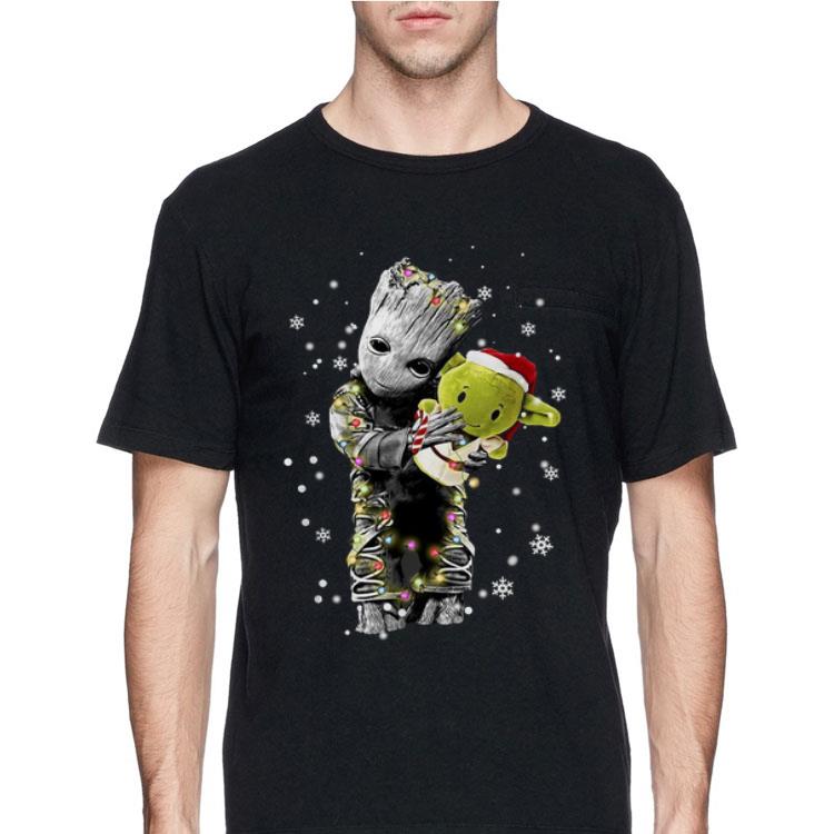 Baby Groot hugging baby Yoda Christmas sweater