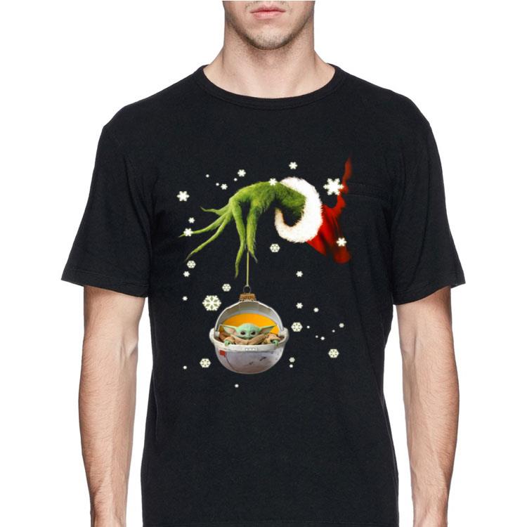 Grinch hand holding Baby Yoda christmas sweater