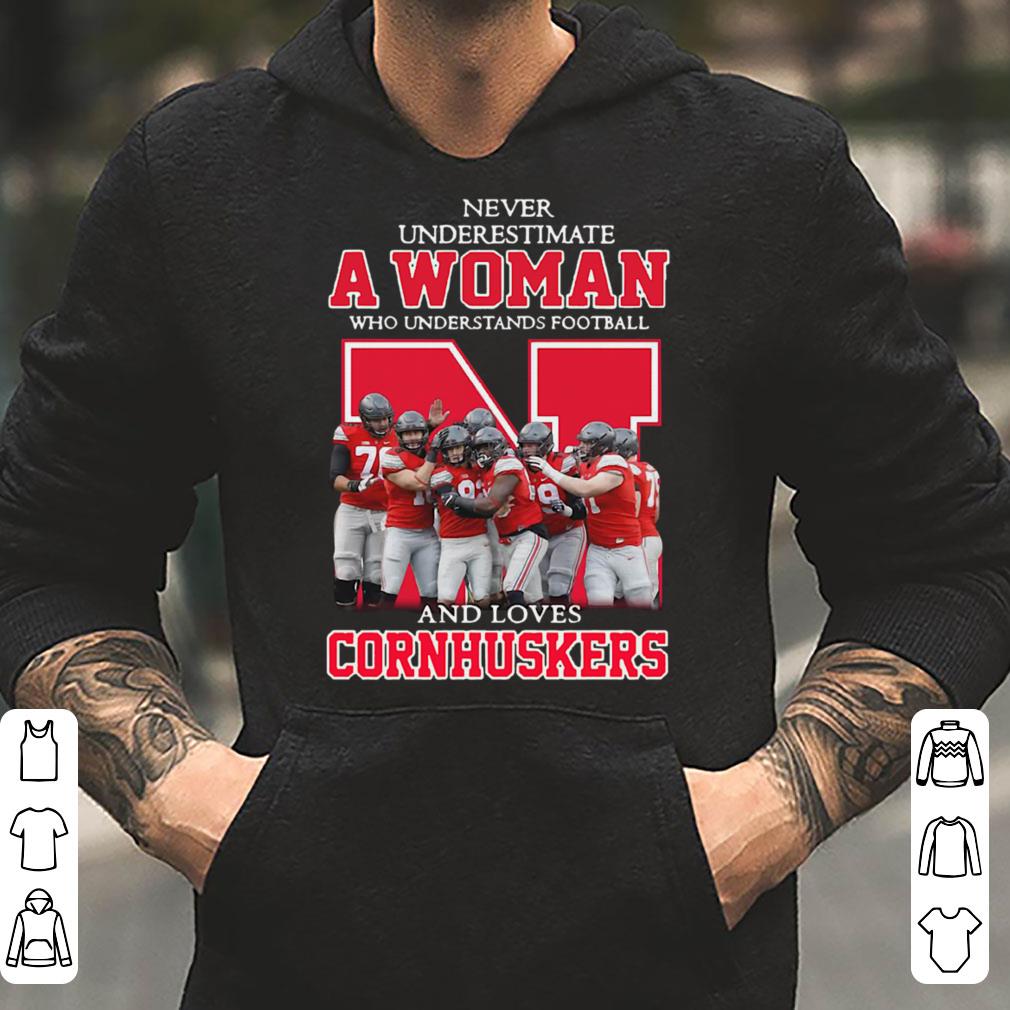 https://cdn.gifteeshirt.com/limitedshirts/2019/01/Never-underestimate-a-woman-who-understands-football-and-loves-Cornhuskers-shirt_4.jpg