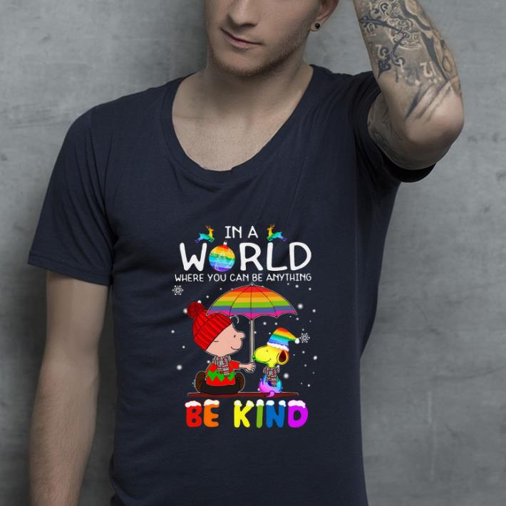 Great LGBT Charlie Brown and Snoopy in a world where you can be anything be kind Christmas shirt