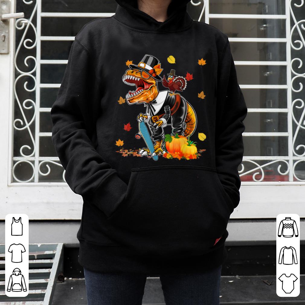 Top Kids Turkey Dinosaur Holding Skateboard Pumpkin Thanksgiving shirt