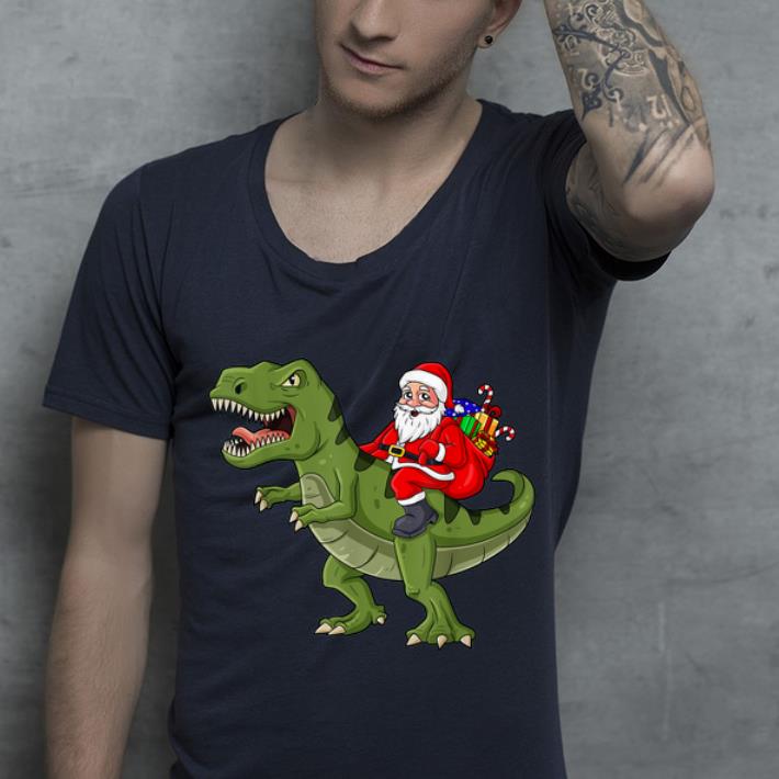 Top Santa Claus Riding T Rex Dinosaur Christmas shirt
