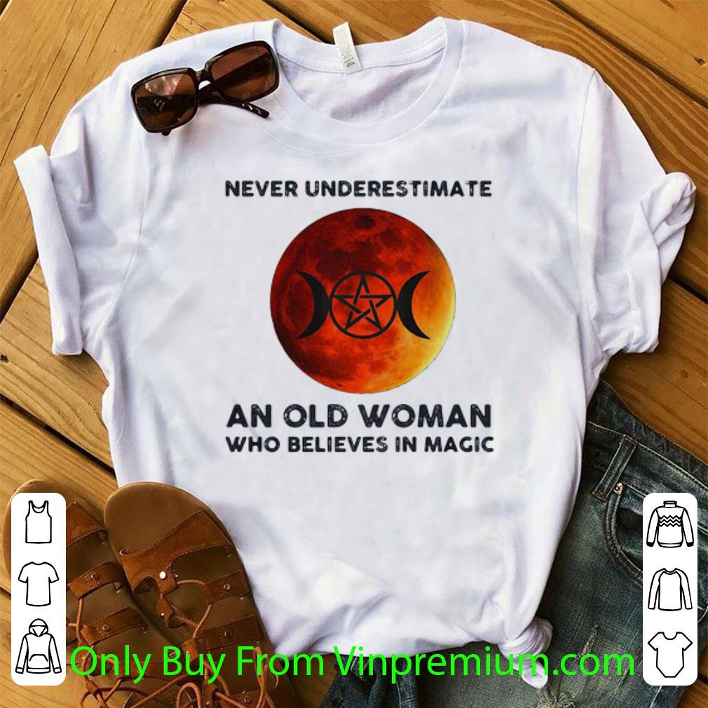 Official Never Underestimate An Old Woman Who Believes In Magic shirt