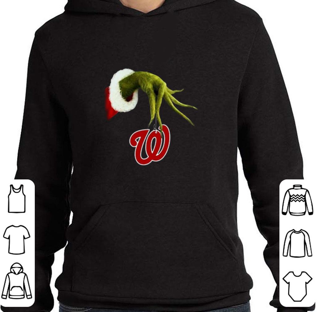 Christmas Grinch hand holding Washington Nationals shirt