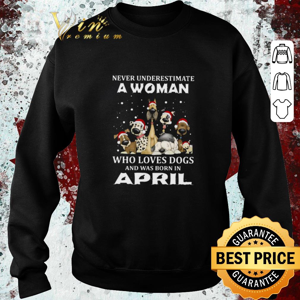 Top Never Underestimate A Woman Who Loves Dogs And Was Born In April Christmas shirt