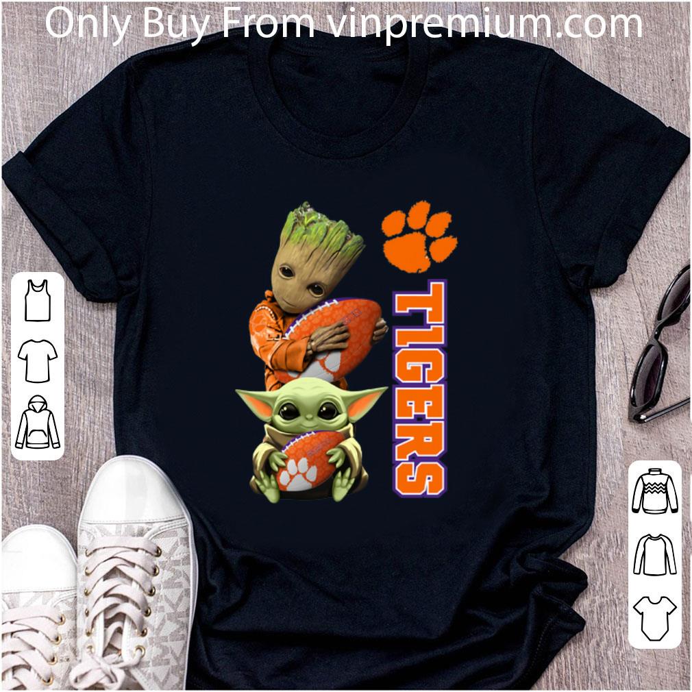 Official Baby Groot And Baby Yoda Hug Clemson Tigers shirt Official Baby Groot And Baby Yoda Hug Clemson Tigers shirt