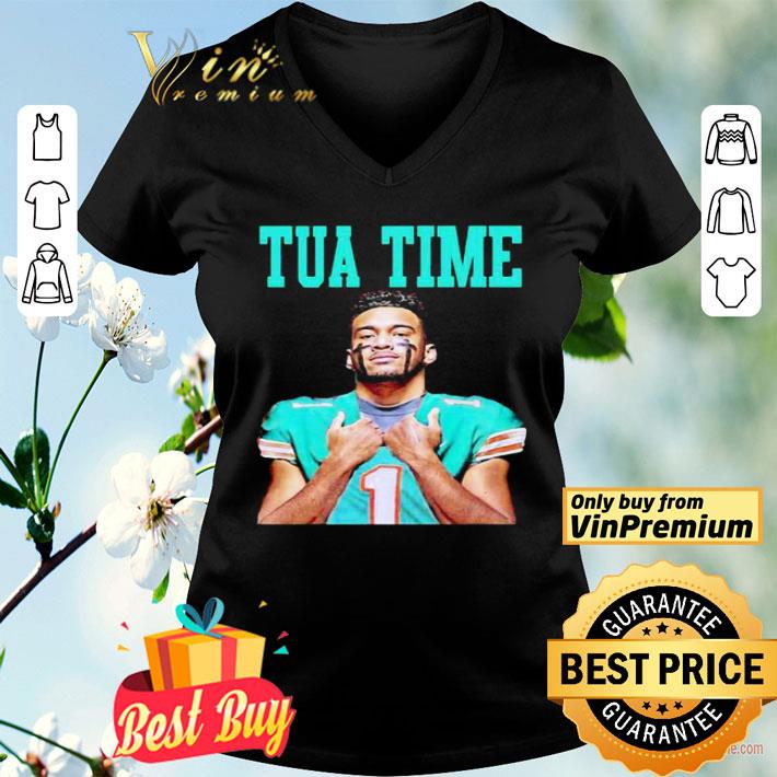Tua in a miami dolphins team football shirt