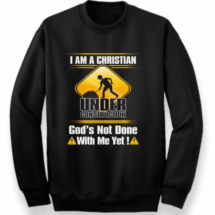 Hot I am a Christian under construction god's not done with me yet shirt