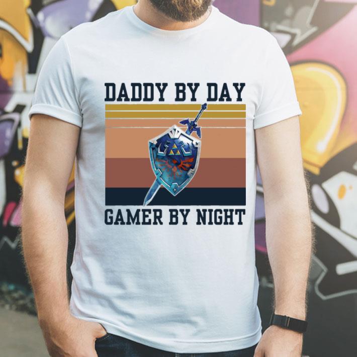 d693b3a8 vintage legend of zelda shield daddy by day gamer by night shirt 4 - Vintage Legend Of Zelda Shield Daddy By Day Gamer By Night shirt